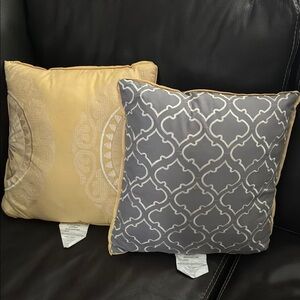 2 accent bedding pillows for a quilt set in my closet 16” x 16”
